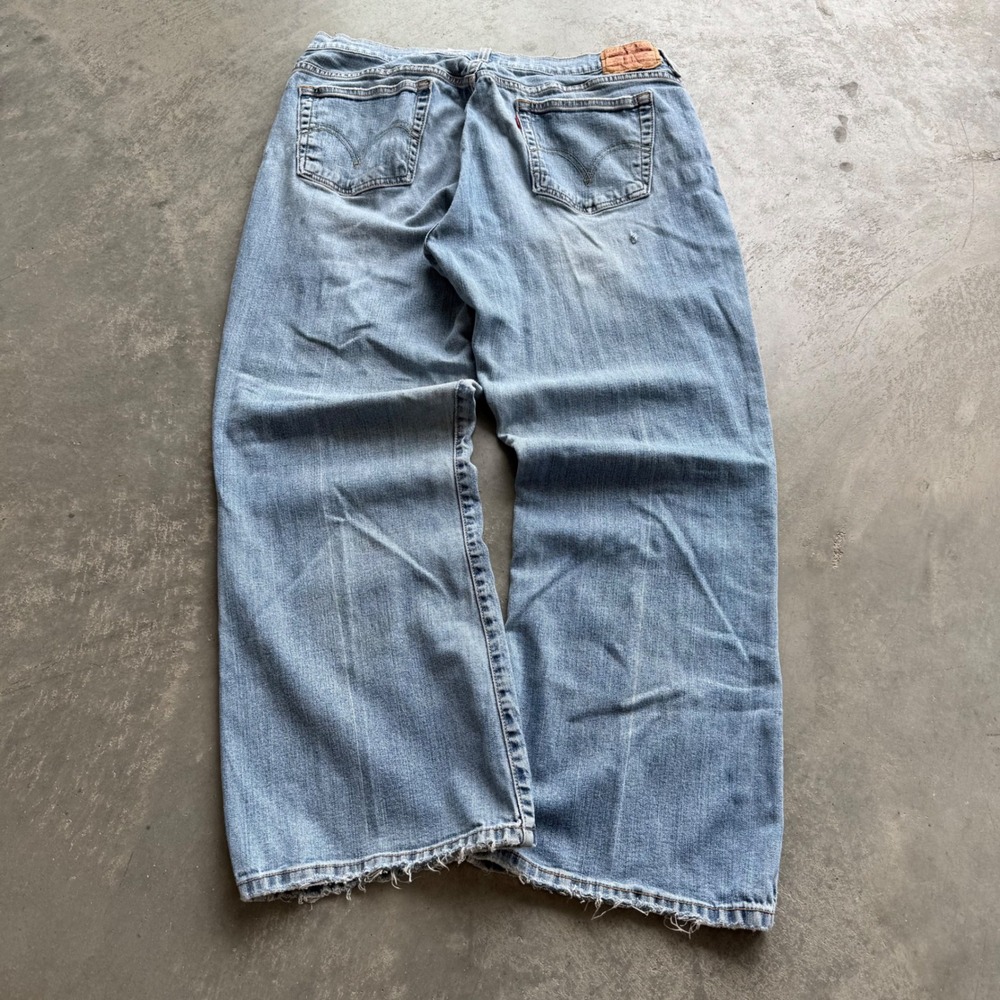 Levis 515 Baggy Bootcut Jeans Mens 33x28 Light Wash Denim Blue Distressed Hem